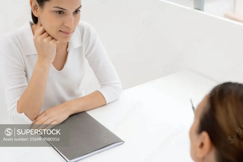 Young businesswoman conducting job interview