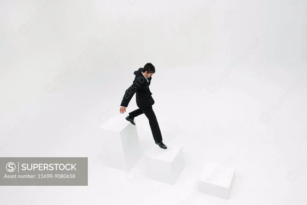 Businessman descending steps
