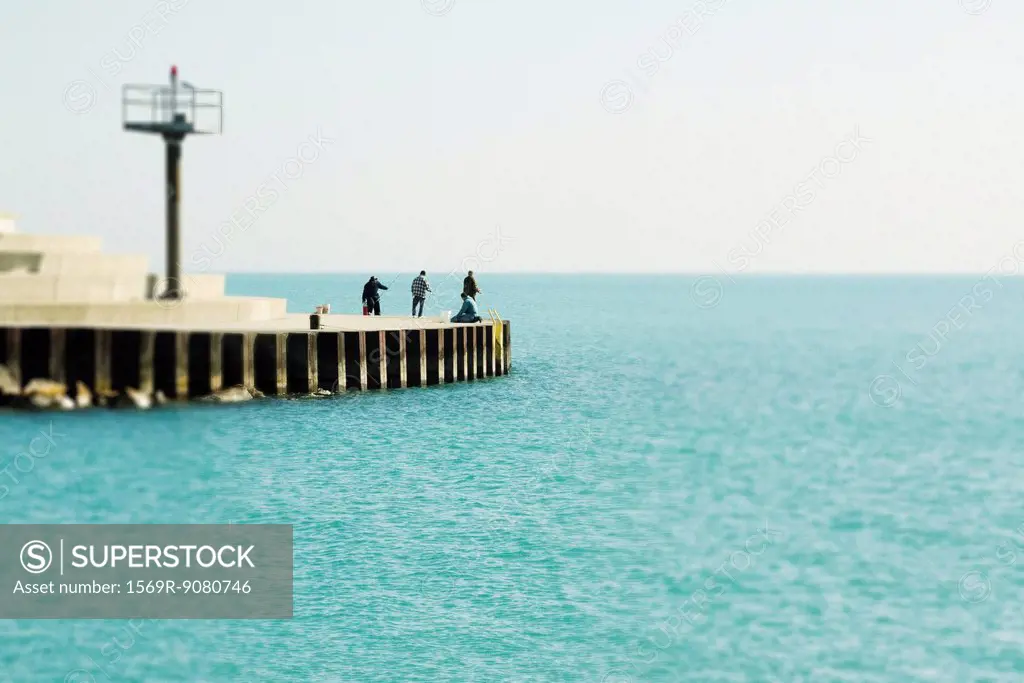 Salmon fishermen on the shores of Lake Michigan, Chicago Lake View