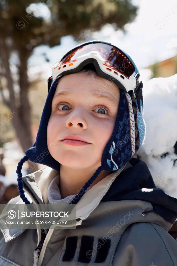 Boy wearing ski goggles, portrait