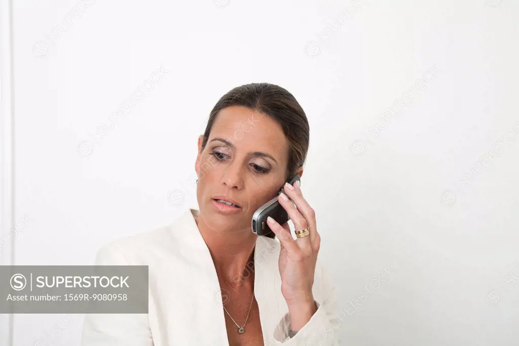Mature businesswoman talking on cell phone
