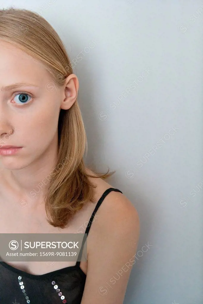 Young woman with worried expression, portrait