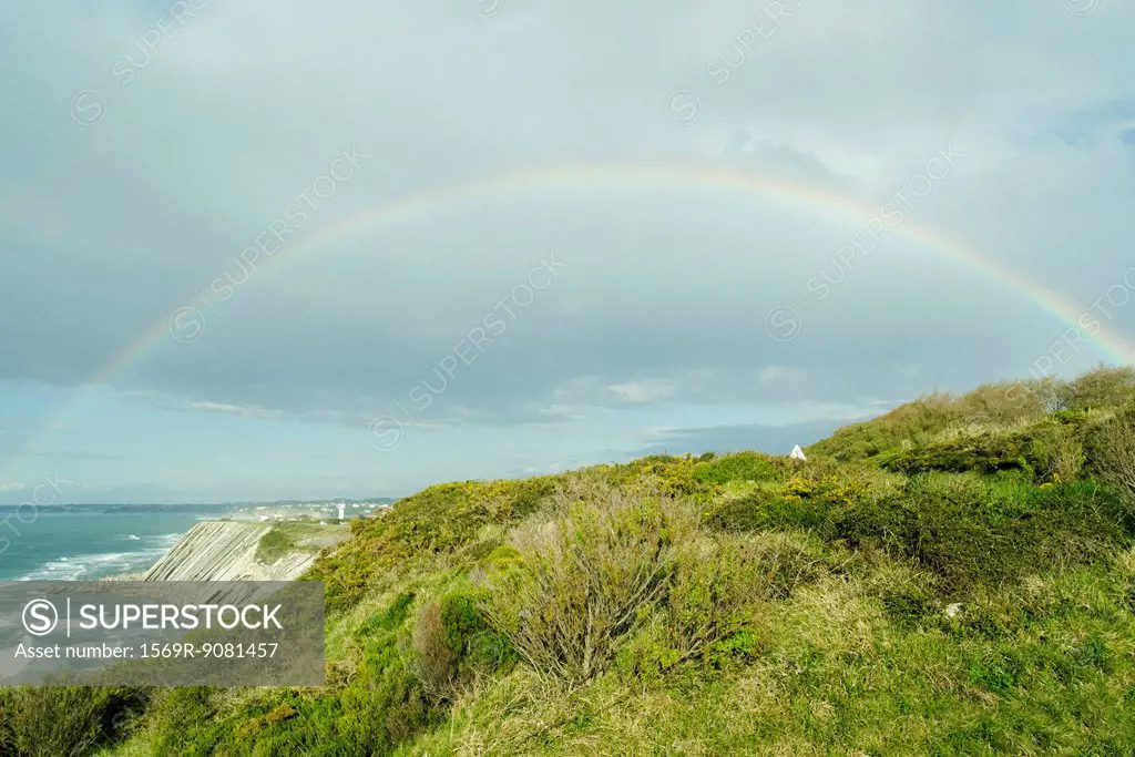 Rainbow on the cliffs of Ciboure, France