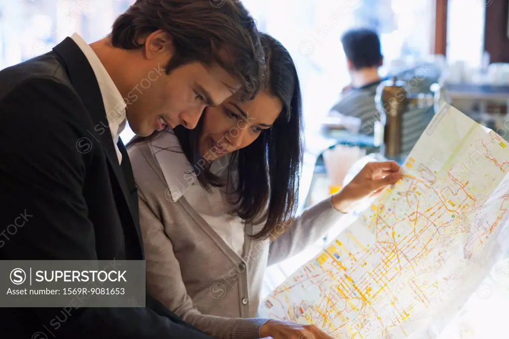 Couple looking at map together
