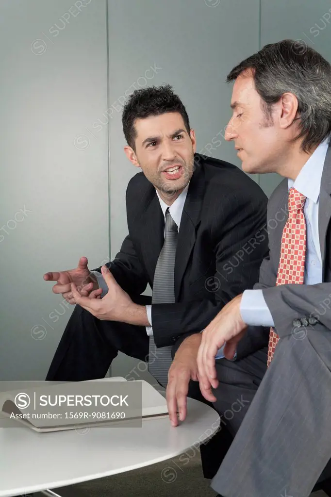 Businessmen discussing work