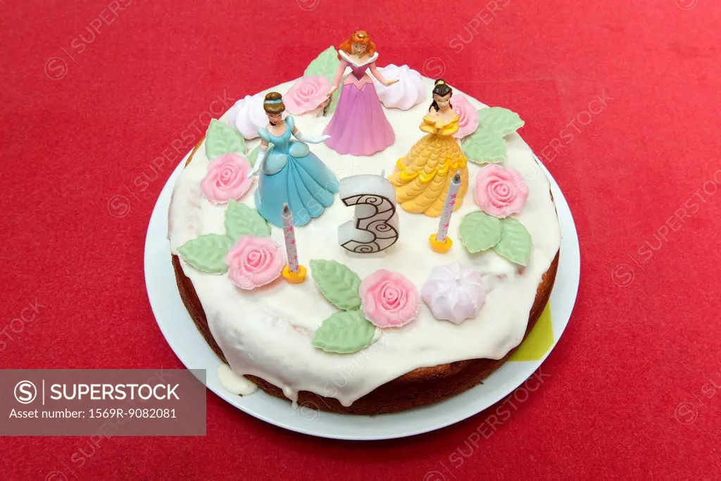 Birthday cake for three year old decorated with princess figurines