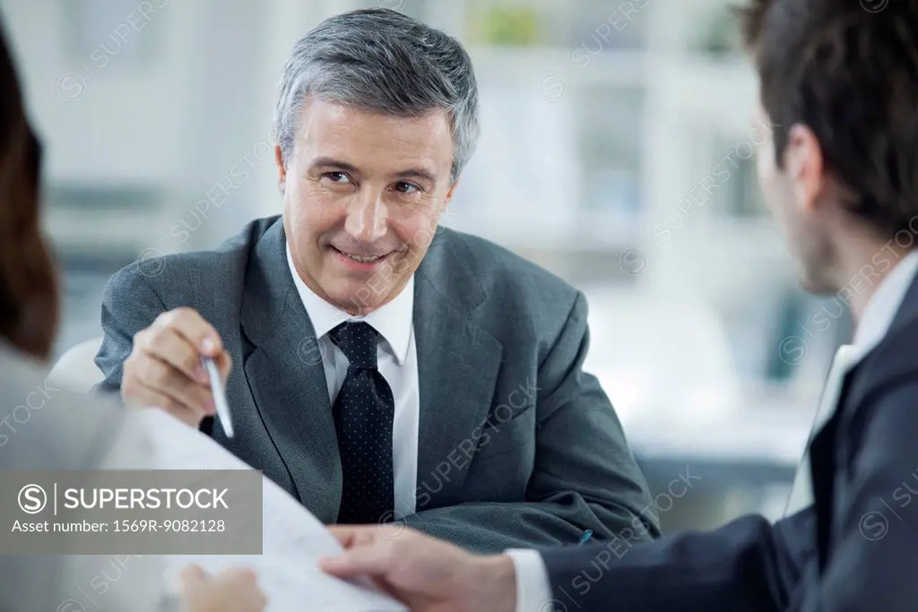 Businessman meeting with clients