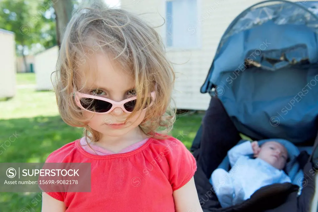 Little girl wearing sunglasses, portrait
