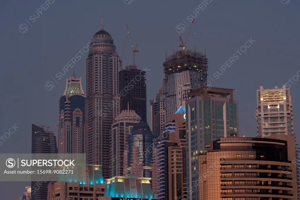 Skyscrapers illuminated at twilight, Dubai, United Arab Emirates