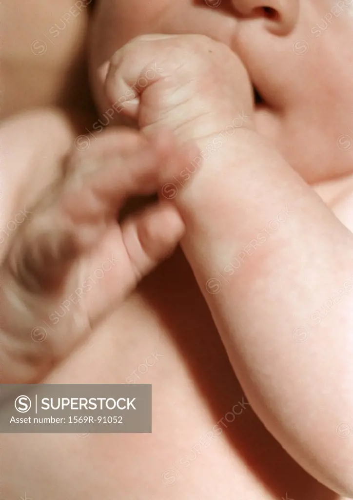 Baby sucking thumb, close-up