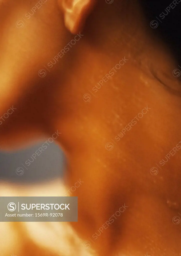 Woman´s wet neck, close-up, blurred