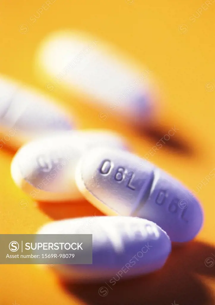 Medicine tablets, close-up, blurred background