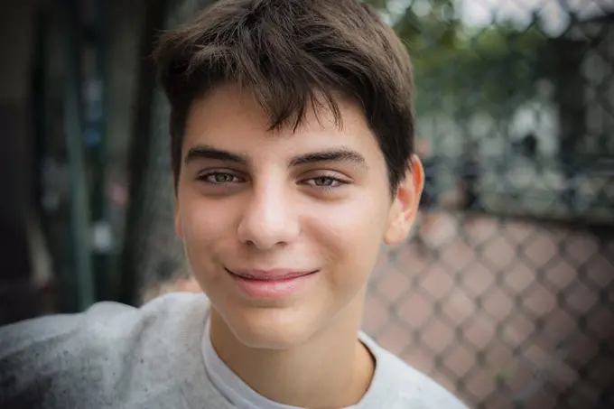 Close-up of smiling teenage boy