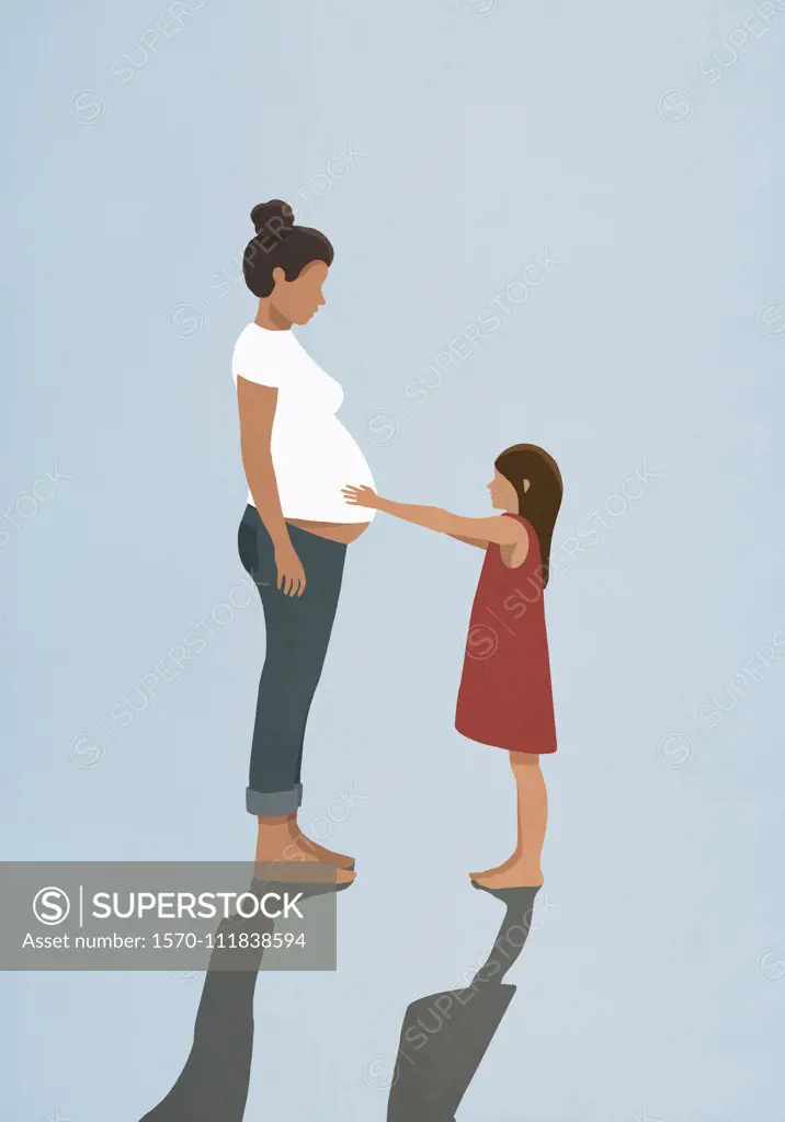 Curious daughter touching pregnant mothers stomach