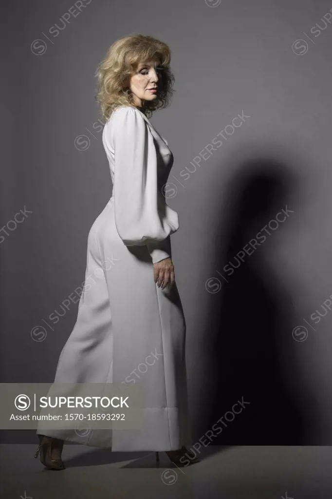 Portrait stylish woman in white