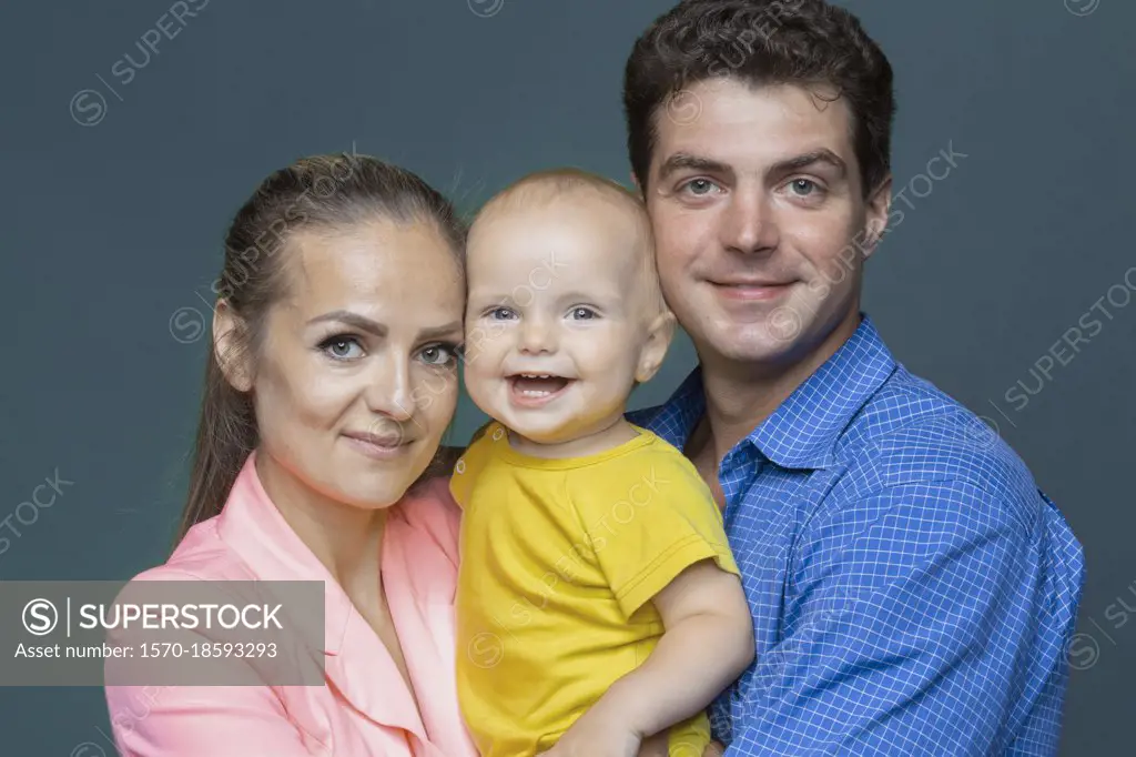 Portrait happy parents and baby son