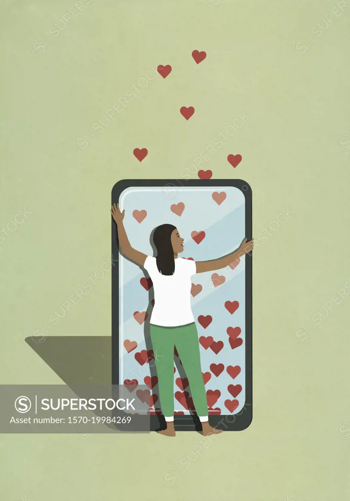 Woman hugging smart phone with hearts