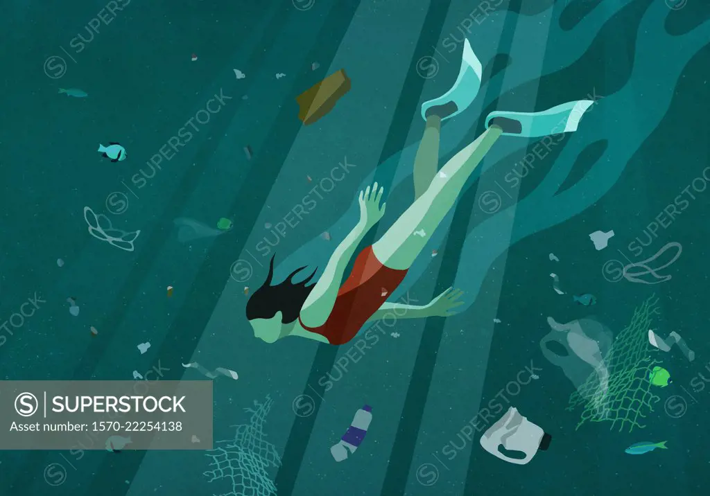 Woman swimming underwater in sea among pollution