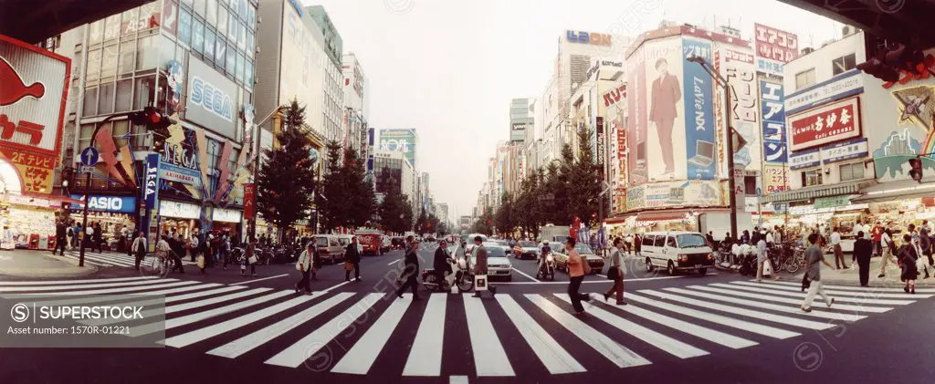 People walking in crosswalk, Tokyo, Japan 