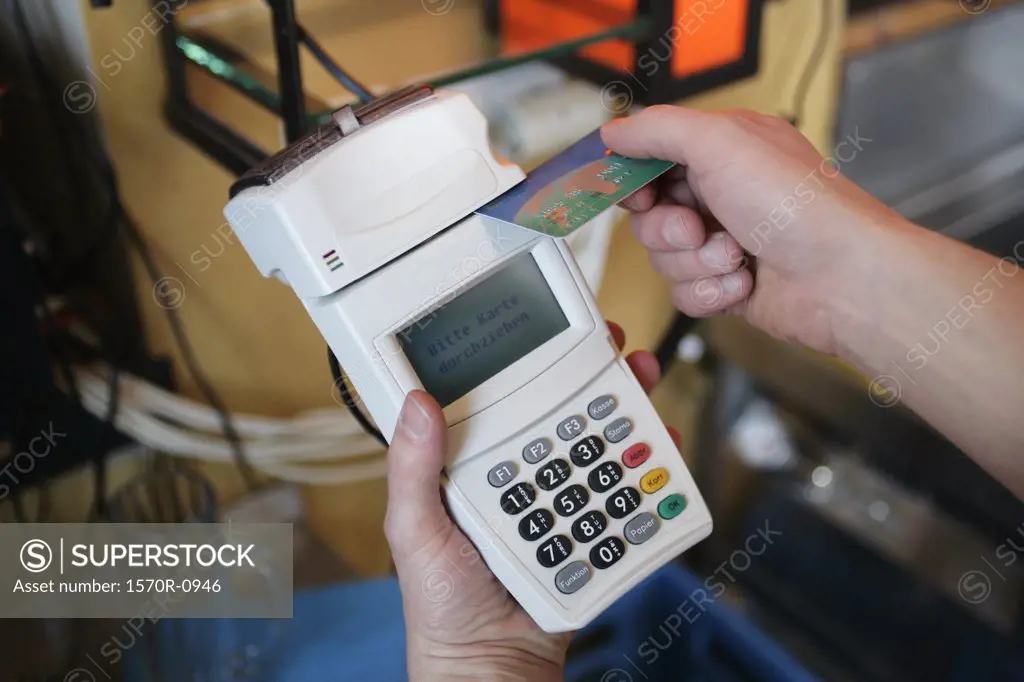 Man using credit card reader