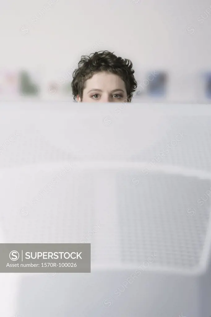 Woman staring at computer monitor