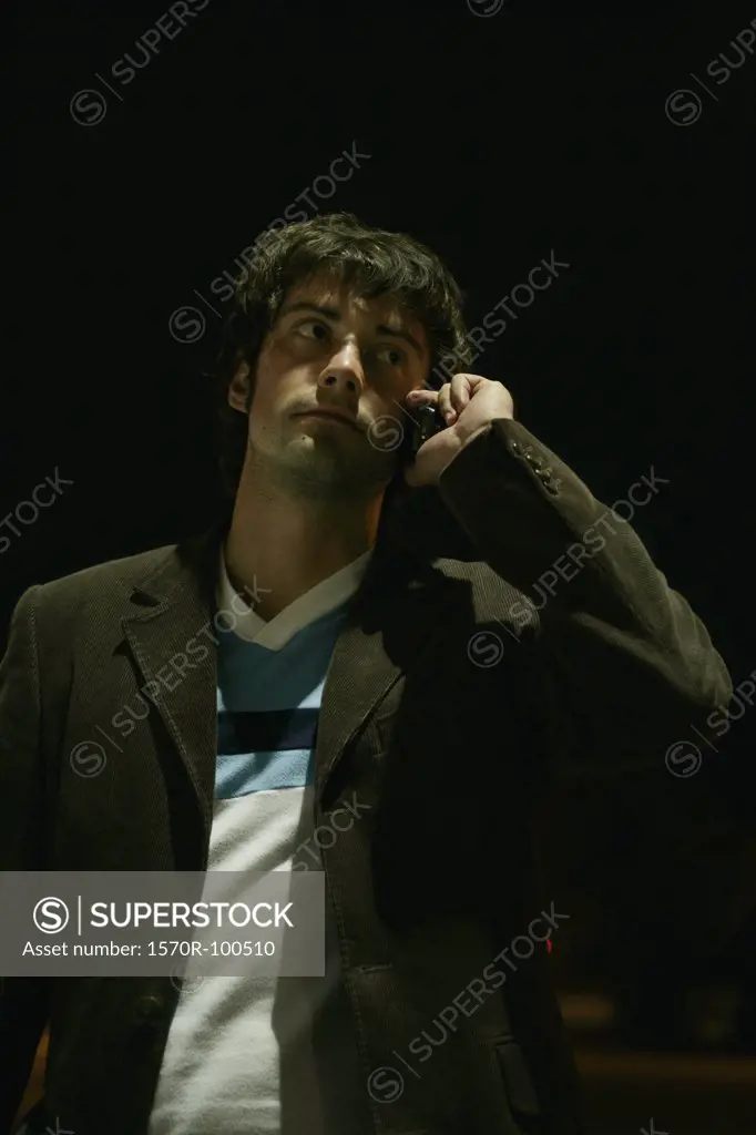 Man listening to cell phone