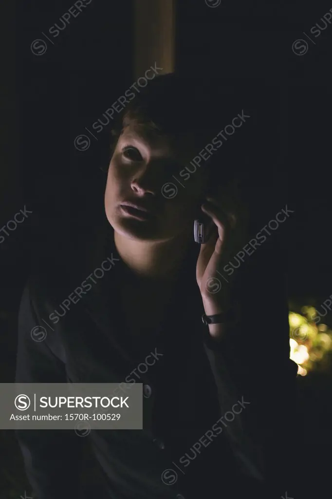 Woman listening to cell phone