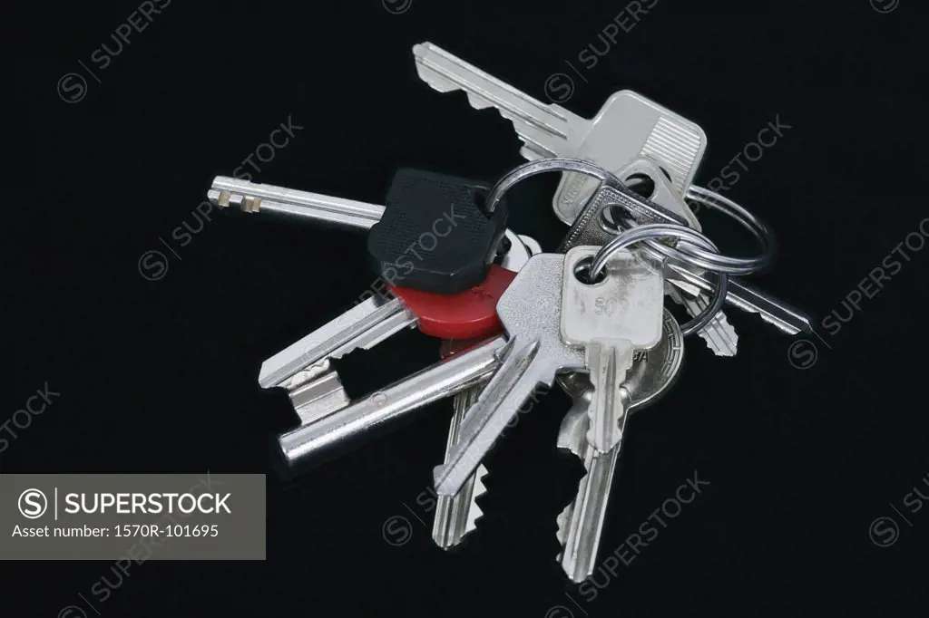 A group of keys on a black surface