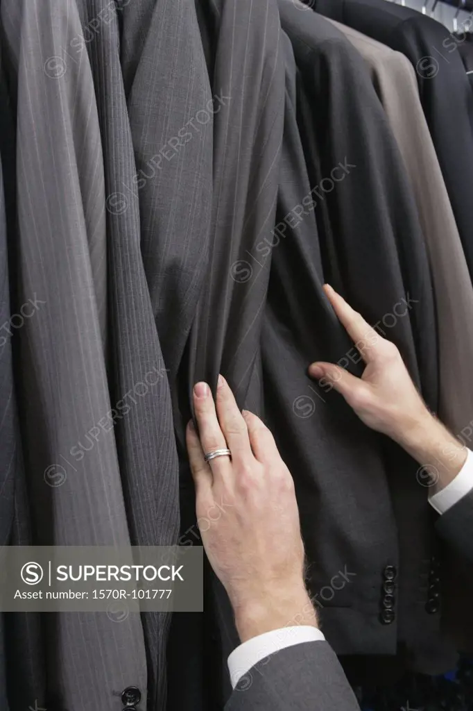 A man shopping for a suit
