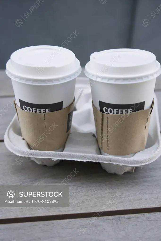 Two disposable coffee cups