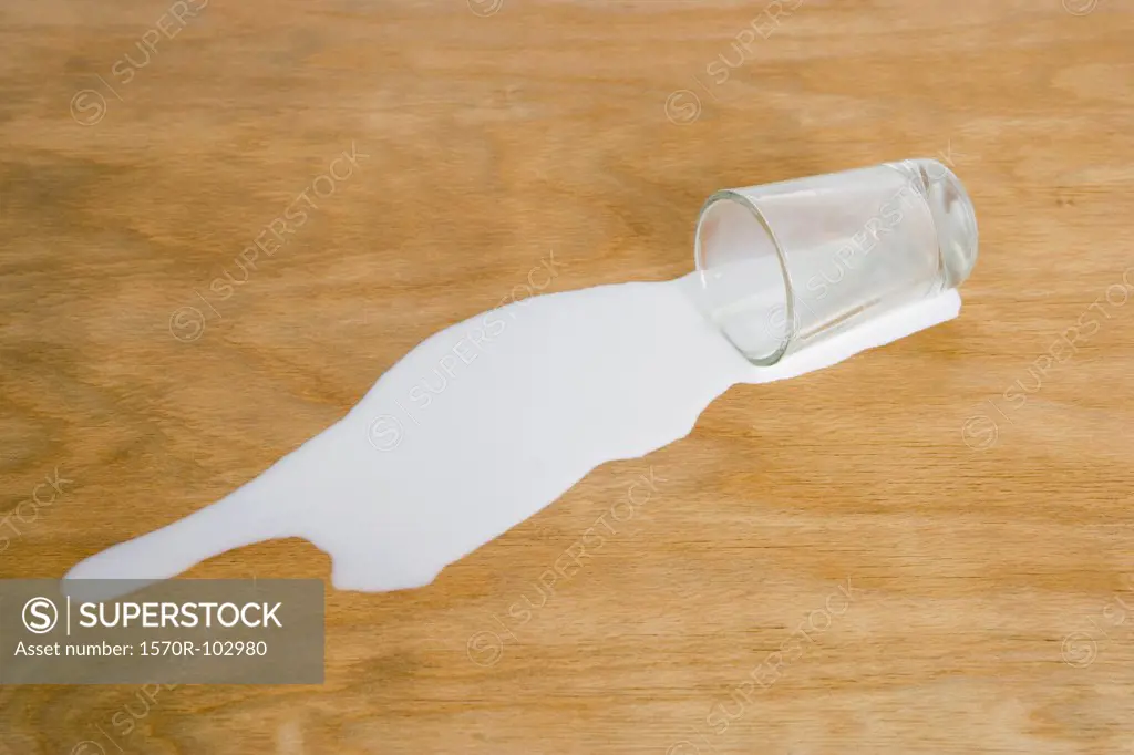 A glass of spilled milk