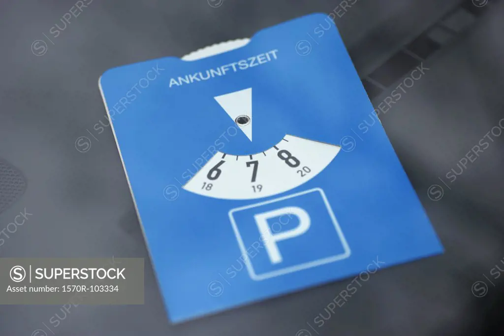 Parking sign on car dashboard