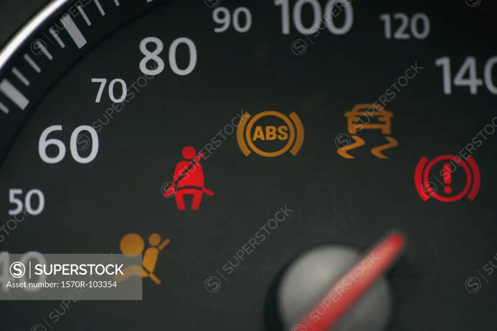Car speedometer with illuminated seat belt sign