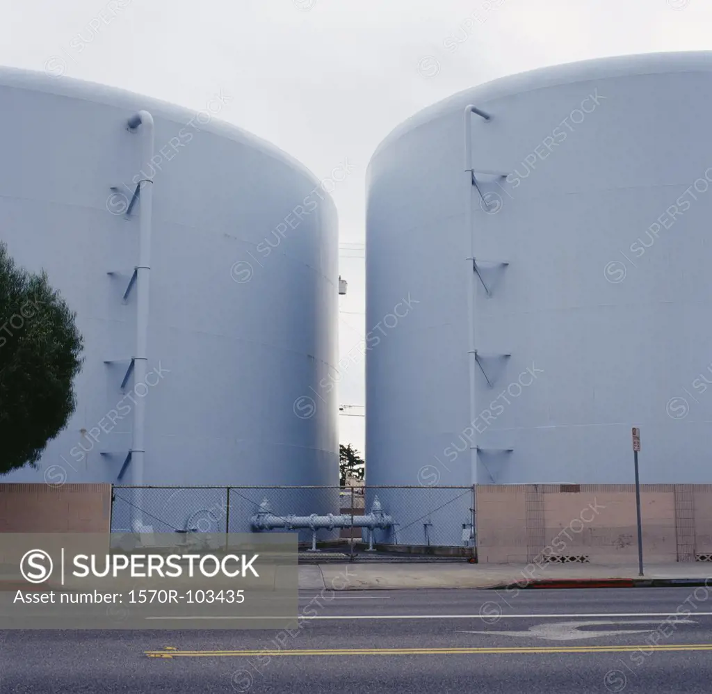 Pair of blue storage tanks