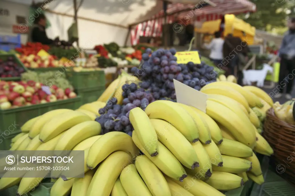 Bananas and grapes at farmers market
