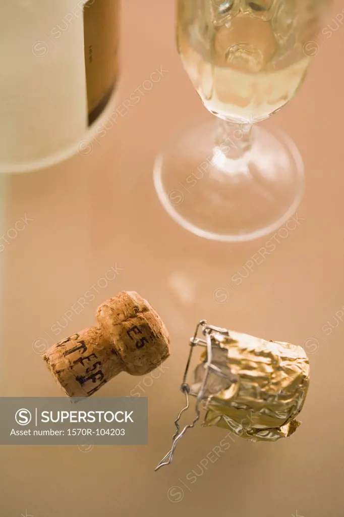 Close-up of champagne and cork