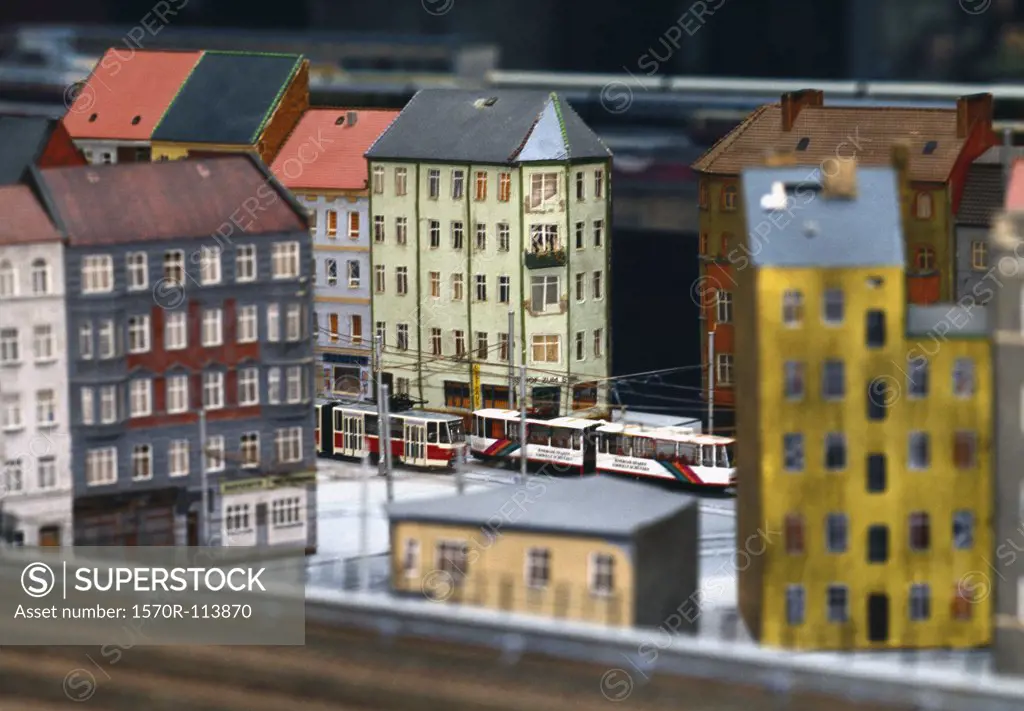 Model of city intersection with cable cars and apartment buildings