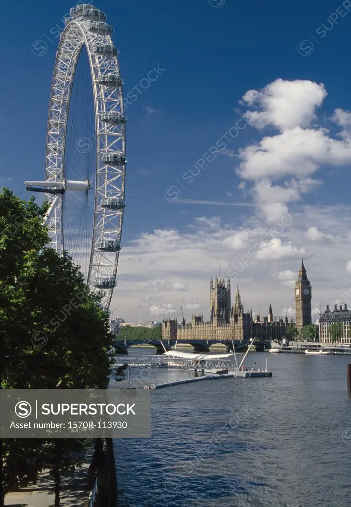 Big Ben and the Houses of Parliament across the Thames river from the Millennium Wheel, London, Engl