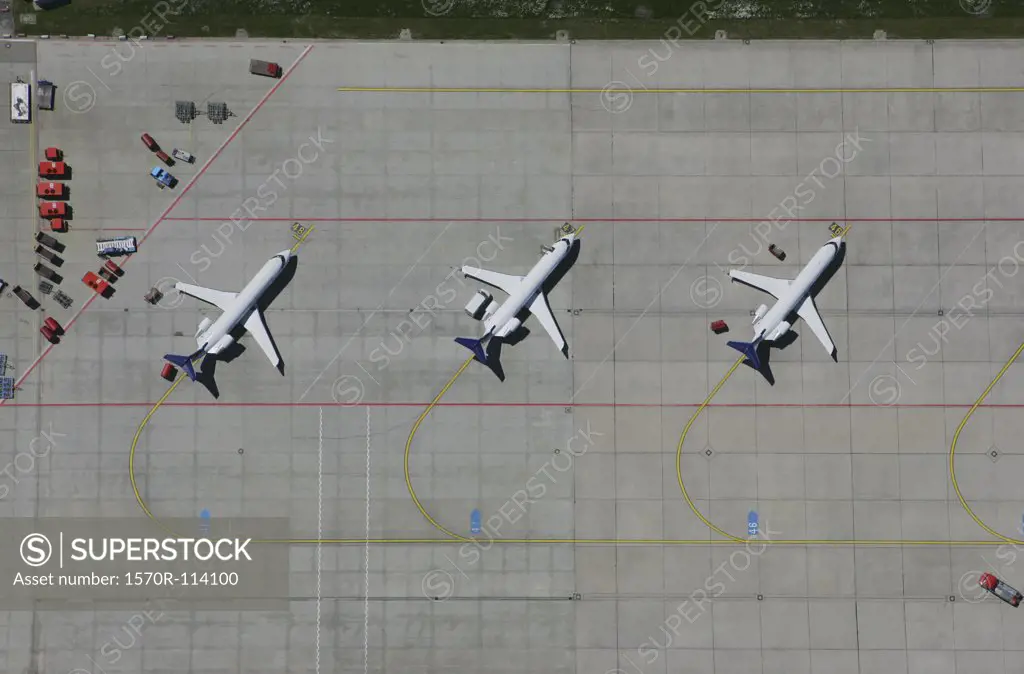 Aerial view of a row of airplanes parked