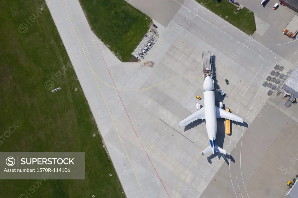 Aerial view of airplane on tarmac