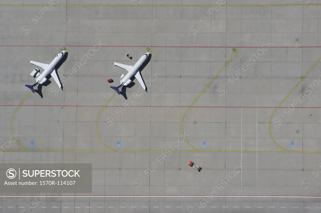 Aerial view of two airplanes parked in a row