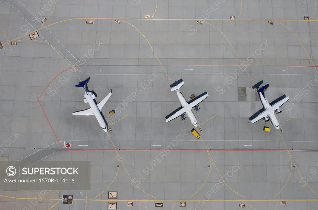 Aerial view of three parked airplanes