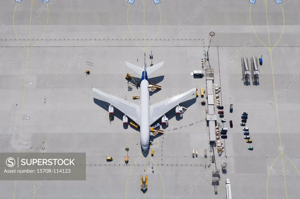 Aerial view of airplane on tarmac