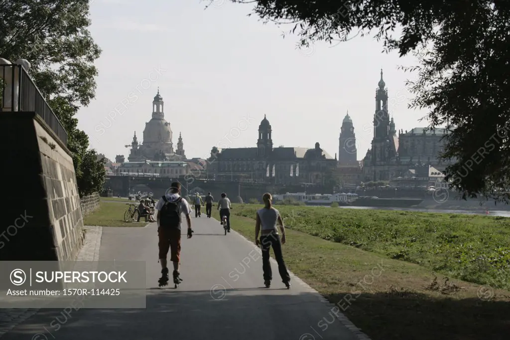 Pathway along Elbe river with view of cityscape, Dresden, Germany