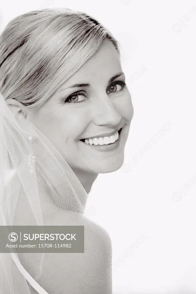 Portrait of a bride looking over her shoulder