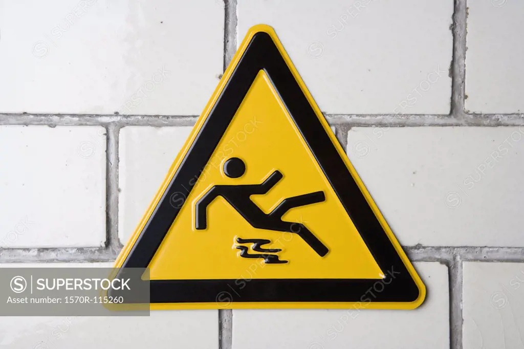 Slippery surface’ warning sign