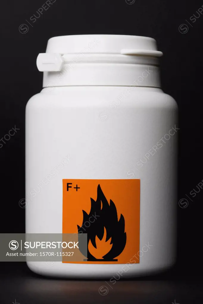 White bottle with flammable’ warning label