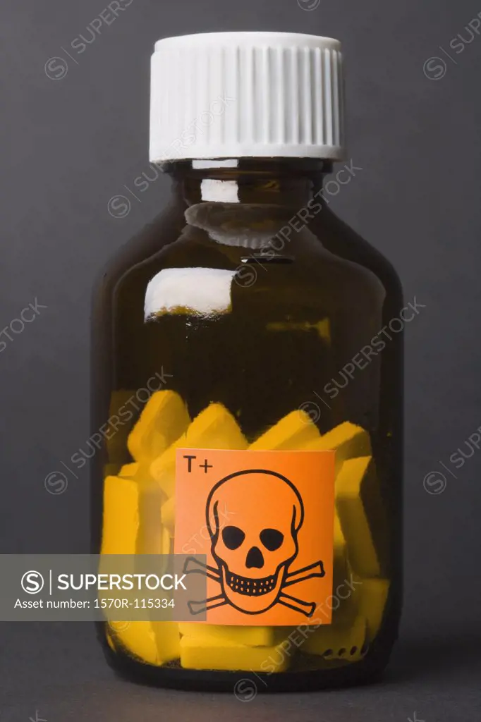 Toxic’ hazard label on glass bottle containing tablets