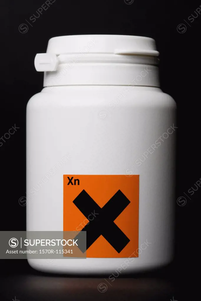 White bottle with harmful effects’ warning label