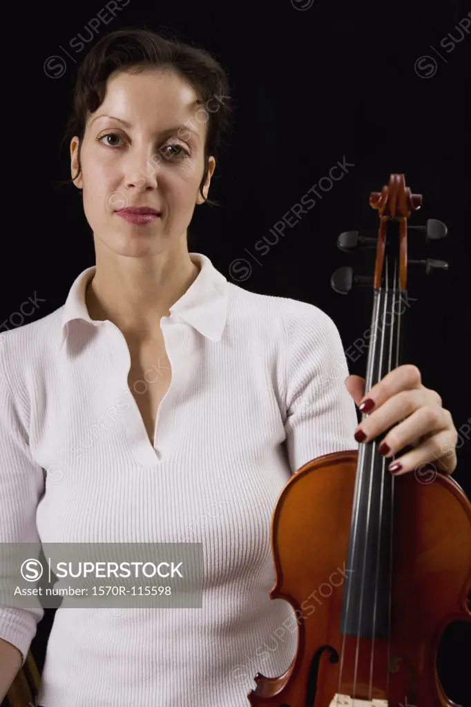 Woman holding a violin